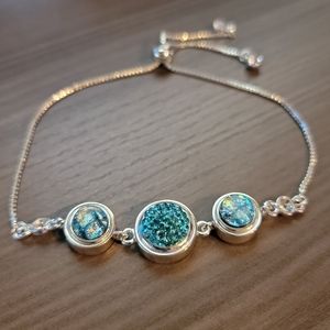 Beautiful Magnabilities silver bolo bracelet, blue magnetic inserts